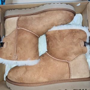 Beige Ugg bow boots